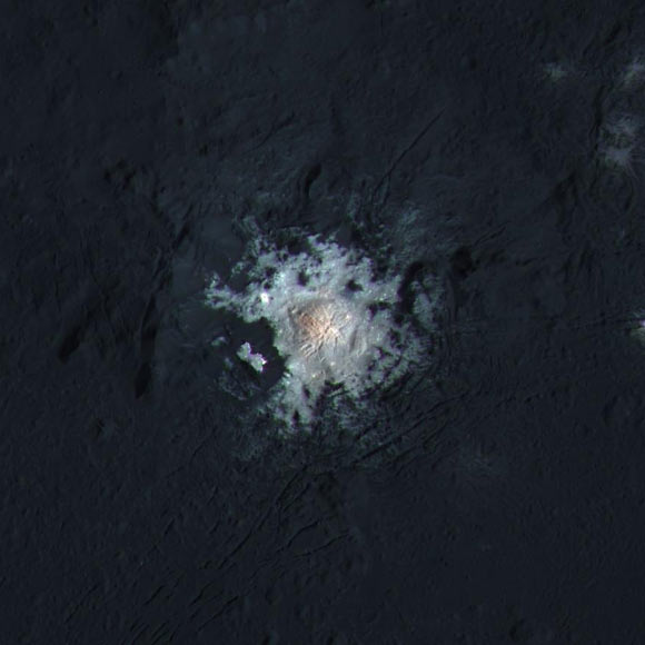Cerealia Facula, a bright dome in the center of Occator Crater on the dwarf planet Ceres, is shown in enhanced color in this view from NASA’s Dawn spacecraft. Image credit: NASA / JPL-Caltech / UCLA / MPS / DLR / IDA / PSI / LPI.