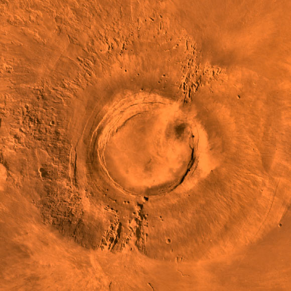 This digital-image mosaic of Mars’ Tharsis plateau shows the extinct volcano Arsia Mons. It was assembled from images that NASA’s Viking 1 orbiter took during its 1976-1980 working life at Mars. Image credit: NASA / JPL / USGS.