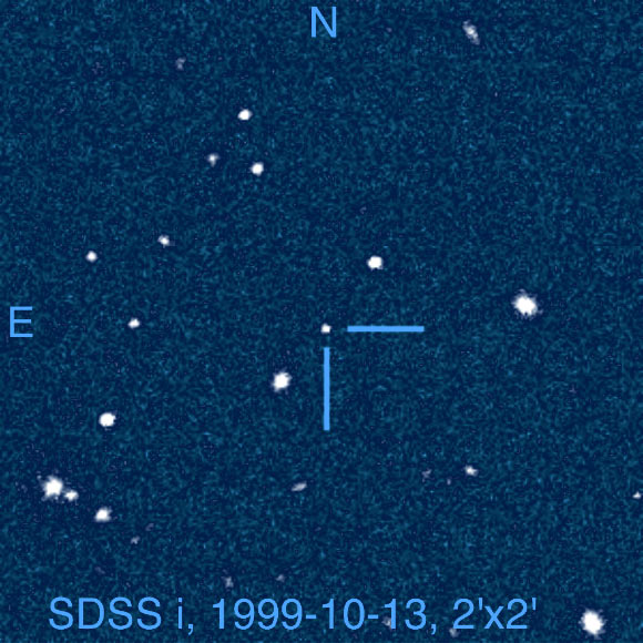 Sloan Digital Sky Survey (SDSS) image of the field centered on SDSS J0104+15 (observation date October 13, 1999). The field is 2 arcmin on a side with north up and east to the left. Image credit: Z.H. Zhang et al.