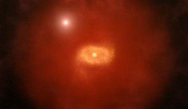 This is an artist impression of a progenitor of Milky Way-like galaxies in the early Universe with a background quasar shining through a ‘super halo’ of hydrogen gas surrounding the galaxy. New ALMA observations of two such galaxies reveal that these vast halos extend well beyond the galaxies’ dusty, star-forming disks. Image credit: A. Angelich / NRAO / AUI / NSF.