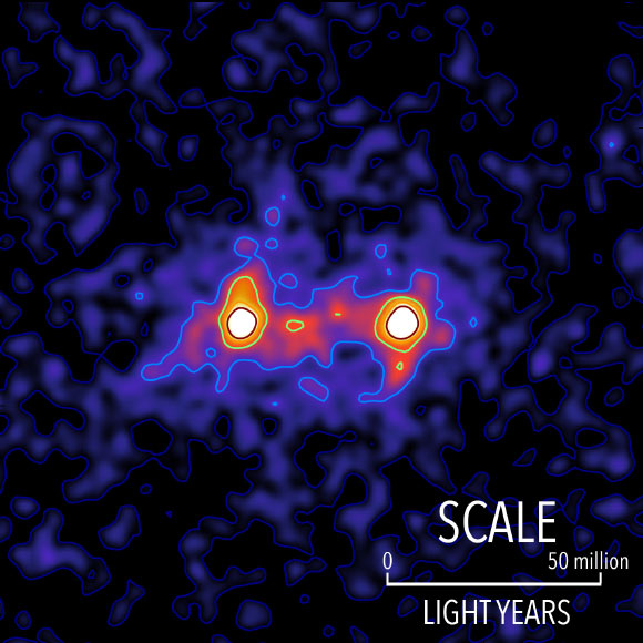Dark matter filaments (shown in red) bridge the space between galaxies (shown in white) on this false color map. Image credit: Seth Epps & Michael Hudson, University of Waterloo.