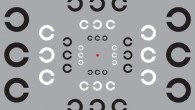 This is an image to demonstrate visual ‘crowding’ and test peripheral vision. Ensure that the red dot in the center of the image is at eye level and focus on it. While holding your focus on the red dot, try to read the middle ‘C’ in every triplet. Is the gap facing left or right? You may find it easier to read in some directions than others. People usually find it easier to read below the dot than above, and easier still to the left or right. Image credit: John Greenwood, University College London.