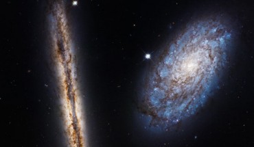 This image of a pair of spiral galaxies NGC 4302 and NGC 4298 was released to celebrate the 27th anniversary of the launch of the NASA/ESA Hubble Space Telescope. Image credit: NASA / ESA / M. Mutchler, STScI.