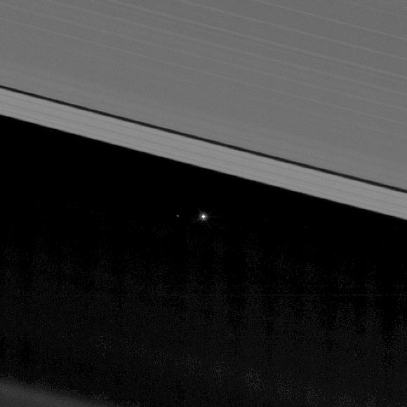 This cropped, zoomed-in version of the above image makes it easier to see the Moon -- a smaller, fainter dot to the left of Earth’s bright dot. Image credit: NASA / JPL-Caltech / Space Science Institute.