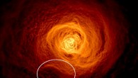 This X-ray image of the hot gas in the Perseus Cluster was made from 16 days of Chandra observations. An oval highlights the location of an enormous wave found to be rolling through the gas. Image credit: NASA’s Goddard Space Flight Center / Stephen Walker et al.