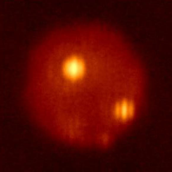 This LBTO image shows Io. Loki Patera is the bright hot spot in the upper part of the disk. Image credit: Large Binocular Telescope Observatory.