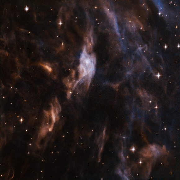 Very intense radiation from EZ Canis Majoris pushes Sh2-308 out further and further, blowing it bigger and bigger. Image credit: NASA / ESA / Hubble.