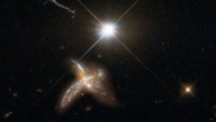 An artist’s impression of a quasar and neighboring merging galaxy. The galaxies observed by Decarli et al are so distant that no detailed images are possible at present. This combination of images of nearby counterparts gives an impression of how they might look in more detail. Image credit: Max Planck Institute for Astronomy / NASA / ESA / Hubble.