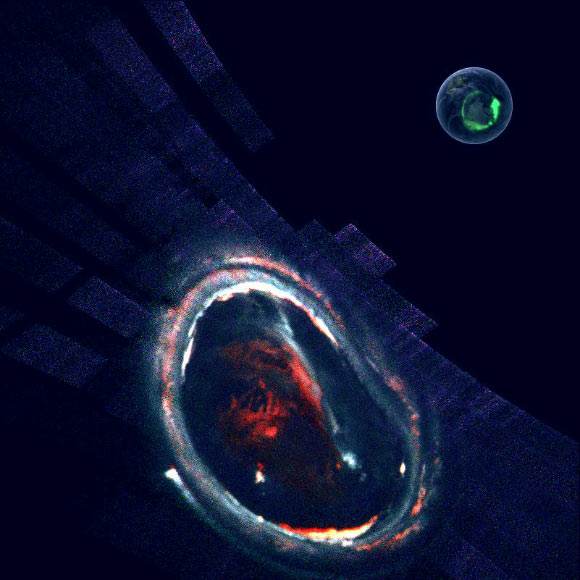 Collected during Juno’s third orbit around Jupiter, this false-color image is inset with an image of Earth’s south pole aurora, approximately to scale, collected September 11, 2005. The streaky colors away from the Jovian auroral region are associated with penetrating electrons. Image credit: NASA / Southwest Research Institute.