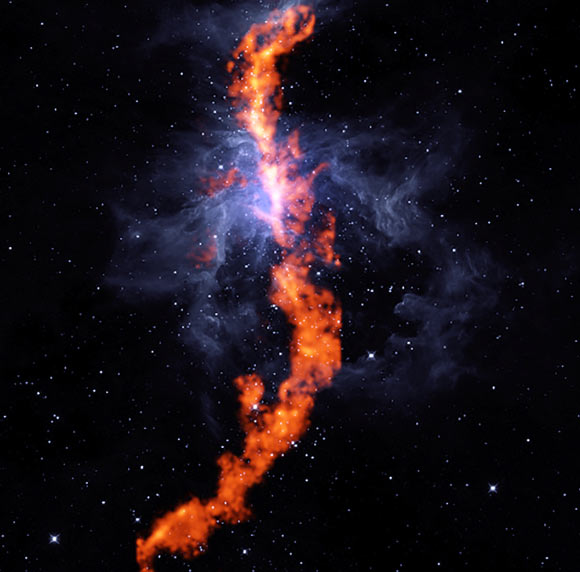 A ribbon of ammonia -- a tracer of star-forming gas -- in the Orion Molecular Cloud as seen with the GBT (orange); background in blue is an infrared image from NASA’s WISE telescope showing the dust in the region. Image credit: R. Friesen, Dunlap Institute / J. Pineda, MPIP / GBO / AUI / NSF / NASA.