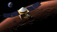 This artist’s concept shows MAVEN in orbit around Mars, with a fanciful image of Earth in the background. Image credit: NASA / GSFC.
