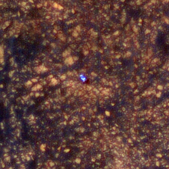 The exaggerated color makes Curiosity appear bluer than it really looks. Image credit: NASA / JPL-Caltech / University of Arizona.