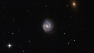 This image shows the galaxy 2XMM J143450.5+033843, which lies in the constellation Virgo, some 400 million light-years away. Image credit: NASA / ESA / Hubble.