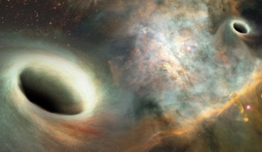 This artist’s conception shows two supermassive black holes, similar to those observed by Bansal et al, orbiting one another more than 750 million light years from Earth. Image credit: Josh Valenzuela, University of New Mexico.