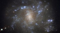 This image shows the barred spiral galaxy NGC 2500, which lies in the northern constellation of Lynx, about 32 million light-years away. Image credit: NASA / ESA / Hubble.