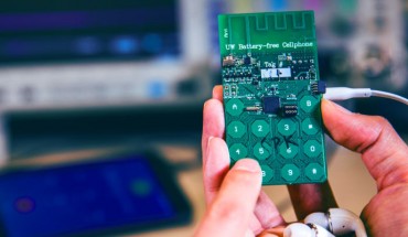 The battery-free phone can sense speech, actuate the earphones, and switch between uplink and downlink communications, all in real time. It is powered by either ambient radio signals or light. Image credit: Mark Stone, University of Washington.