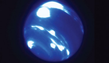 This image from the Keck Telescope shows an extremely bright, nearly circular storm system near Neptune’s equator. Image credit: Ned Molter & Imke de Pater, University of California, Berkeley / C. Alvarez, W. M. Keck Observatory.