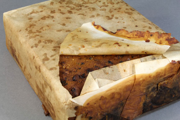 The Huntley and Palmer’s fruit cake from Cape Adare. Image credit: New Zealand Antarctic Heritage Trust.
