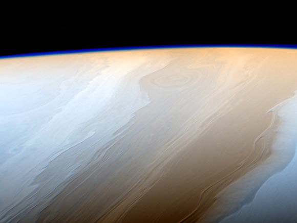 This is a false color image of Saturn, with exaggerated colors to enhance subtle variations in color to bring out details of the cloud structure. The view is centered on 46 degrees north latitude on Saturn. The filter centered at 727 nm was used for red in this image; the filter centered at 750 nm was used for blue. Image credit: NASA / JPL-Caltech / Space Science Institute.