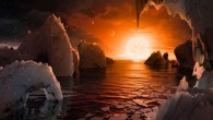 This artist’s concept allows us to imagine what it would be like to stand on the surface of TRAPPIST-1f. Because this planet is thought to be tidally locked to its star, meaning the same face of the planet is always pointed at the star, there would be a region called the terminator that perpetually divides day and night. If the night side is icy, the day side might give way to liquid water in the area where sufficient starlight hits the surface. One of the unusual features of TRAPPIST-1 planets is how close they are to each other -- so close that other planets could be visible in the sky from the surface of each one. In this view, the planets in the sky correspond to TRAPPIST1e (top left crescent), d (middle crescent) and c (bright dot to the lower right of the crescents). TRAPPIST-1e would appear about the same size as the Moon and TRAPPIST1-c is on the far side of the star. The star itself, an ultra-cool dwarf, would appear about three times larger than our own Sun does in Earth’s skies. Image credit: NASA / JPL-Catlech.