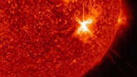 An X9.3-class solar flare flashes in the middle of the Sun on September 6, 2017. This image was captured by NASA’s Solar Dynamics Observatory at 11:58:42 UTC and shows light in the 304 angstrom wavelength. Image credit: NASA / GSFC / SDO.