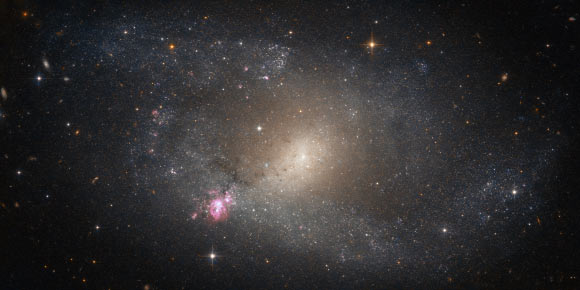 This image, taken with the Advanced Camera for Surveys on board the NASA/ESA Hubble Space Telescope, shows the barred spiral galaxy NGC 5398. Image credit: NASA / ESA / Hubble.