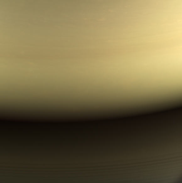This view is the last image taken by the imaging cameras on NASA’s Cassini spacecraft. The cameras obtained this view at approximately the same time that Cassini’s visual and infrared mapping spectrometer made its own observations of the impact area in the thermal infrared. This location -- the site of Cassini's atmospheric entry -- was at this time on the night side of the planet, but would rotate into daylight by the time Cassini made its final dive into Saturn’s upper atmosphere, ending its remarkable 13-year exploration of Saturn. The view was acquired on September 14, 2017 at 19:59 UTC at a distance of 394,000 miles (634,000 km) from Saturn. Image credit: NASA / JPL-Caltech / Space Science Institute.