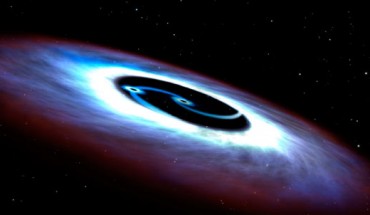 An artistic illustration of a binary black hole. Image credit: NASA / ESA / G. Bacon, STScI.