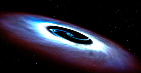 An artistic illustration of a binary black hole. Image credit: NASA / ESA / G. Bacon, STScI.