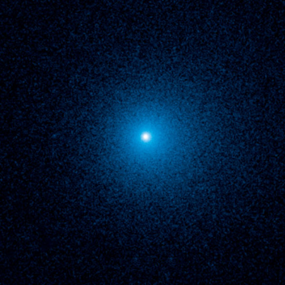 This Hubble image shows a fuzzy cloud of dust, called a coma, surrounding the comet C/2017 K2 PANSTARRS (K2), the farthest active comet ever observed entering the Solar System. Image credit: NASA / ESA / D. Jewitt, University of California, Los Angeles.