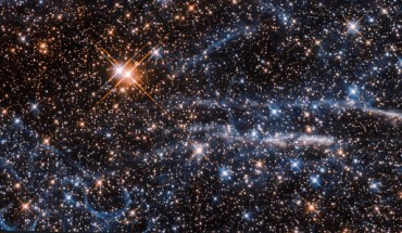 This Hubble image shows the Honeycomb Nebula (to the lower left) and part of the Tarantula Nebula. Image credit: NASA / ESA / Hubble / Judy Schmidt, www.geckzilla.com.