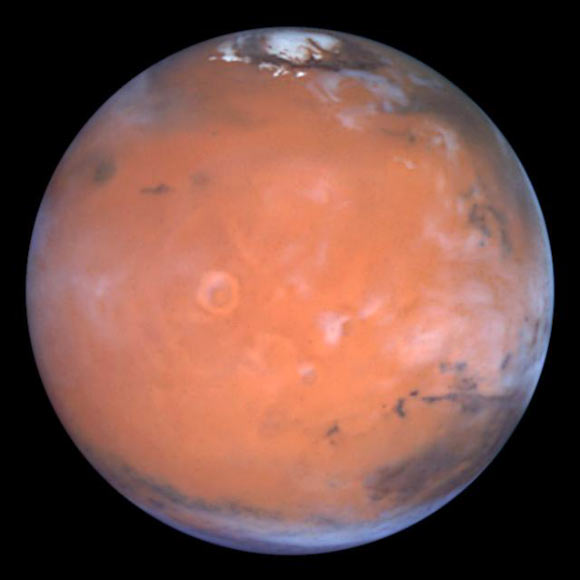 Mars Odyssey spotted possible water ice in the Medusa Fossae area of Mars, which is in an equatorial region of the planet to the lower left in this view. Image credit: Steve Lee, University of Colorado / Jim Bell, Cornell University / Mike Wolff, Space Science Institute / NASA.