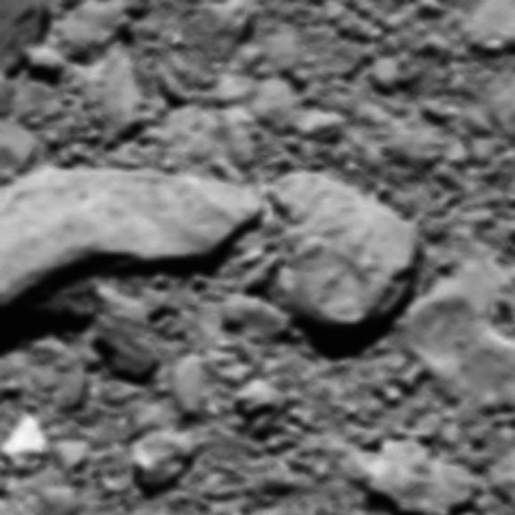 A final image from ESA’s Rosetta spacecraft, shortly before it made a controlled impact onto Comet 67P/Churyumov–Gerasimenko on September 30, 2016, was reconstructed from residual telemetry. The image measures about 1 m across. Image credit: ESA / Rosetta / MPS for OSIRIS Team / UPD / LAM / IAA / SSO / INTA / UPM / DASP / IDA.