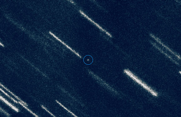 2012 TC4 appears as a dot at the center of this composite image of 37 individual 50-second exposures obtained with the FORS2 instrument on ESO’s Very Large Telescope in 2012. The asteroid is marked with a circle for a better identification. Image credit: ESO / ESA NEOCC / Olivier Hainaut, ESO / Marco Micheli, ESA / Detlef Koschny, ESA.