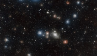 Countless galaxies vie for attention in this VST image of the Fornax Cluster (also known as ACO S 373 and MCL 52), some appearing only as pinpricks of light while others dominate the foreground. One of these is the lenticular galaxy NGC 1316. Image credit: A. Grado & L. Limatola, ESO.