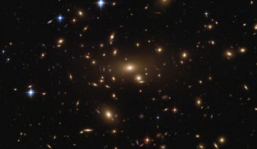 This Hubble image shows the gigantic galaxy cluster Abell 665. Image credit: NASA / ESA / Hubble.