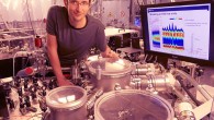 Dr. Thomas Gaumnitz, a postdoctoral fellow in Professor Wörner’s group, with the setup that generates the shortest laser pulses in the world. Image credit: ETH Zurich.