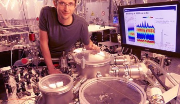 Dr. Thomas Gaumnitz, a postdoctoral fellow in Professor Wörner’s group, with the setup that generates the shortest laser pulses in the world. Image credit: ETH Zurich.