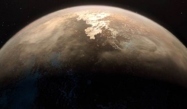 This artist’s impression shows Ross 128b, with its red dwarf parent star in the background. Image credit: M. Kornmesser / ESO.