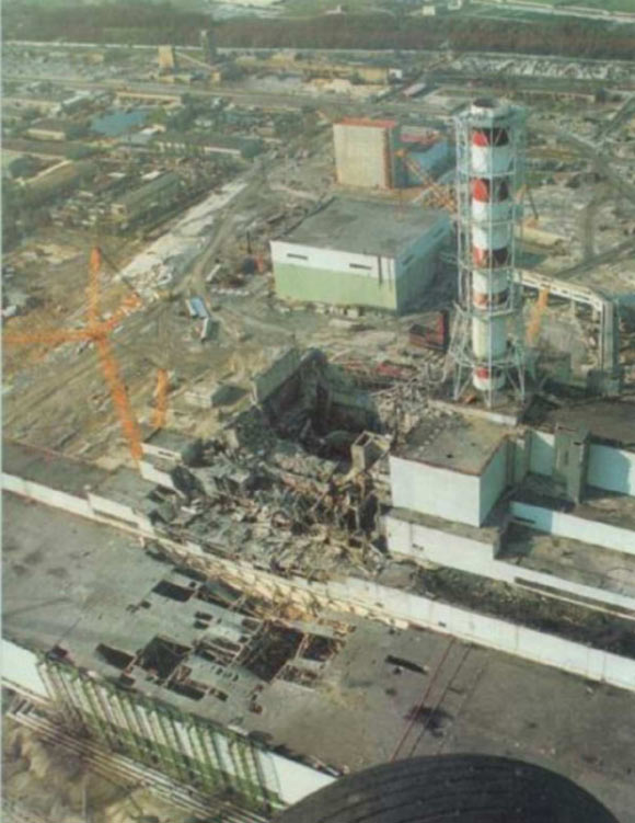 Chernobyl disaster aftermath: reactor 4 (center), turbine building (lower left) and reactor 3 (center right). 