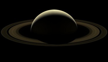 This image from NASA’s Cassini spacecraft shows Saturn and its rings. Six of Saturn’s moons make a faint appearance in this image: the ice-covered moon Enceladus can be seen at the 1 o’clock position; directly below Enceladus, just outside the F ring (the thin, farthest ring from the planet seen in this image) lies the small moon Epimetheus; following the F ring clock-wise from Epimetheus, the next moon seen is Janus; at about the 4:30 position and outward from the F ring is Mimas; inward of Mimas and still at about the 4:30 position is the F-ring-disrupting moon, Pandora; moving around to the 10 o’clock position, just inside of the F ring, is the moon Prometheus. Image credit: NASA / JPL-Caltech / Space Science Institute.