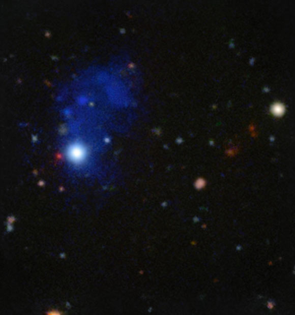 This MUSE image shows a huge cloud of gas around the distant quasar 4C 10.29. Image credit: Arrigoni Battaia et al / ESO.