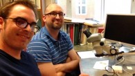 Professor Smith (left) and Professor Landau take a closer look at the Greek fragment identified as the First Apocalypse of James. Image credit: Geoffrey Smith, University of Texas at Austin.
