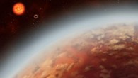 This artist’s concept shows two super-Earth exoplanets, K2-18b and c, orbiting the red dwarf star K2-18. Image credit: Alex Boersma.