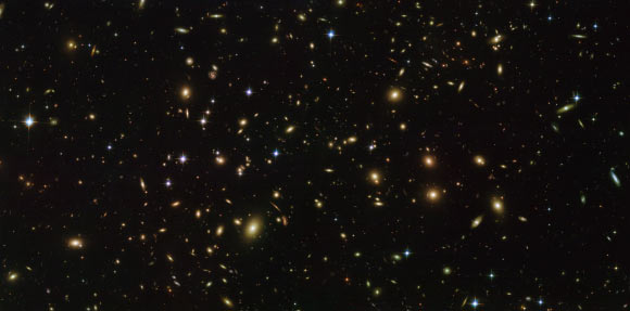 This Hubble image shows Abell 2163, one of the richest and most distant galaxy clusters known. Image credit: NASA / ESA / Hubble.