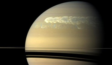 Saturn’s Great Northern Storm churning through the atmosphere in the planet’s northern hemisphere overtakes itself as it encircles the planet in this true-color view from NASA’s Cassini spacecraft. This picture, captured on February 25, 2011, was taken about 12 weeks after the storm began, and the clouds by this time had formed a tail that wrapped around the gas giant. Image credit: NASA / JPL-Caltech / Space Science Institute.