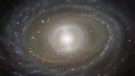This image shows spectacular ribbons of gas and dust wrapping around the pearly center of the barred spiral galaxy NGC 1398. Image credit: ESO.
