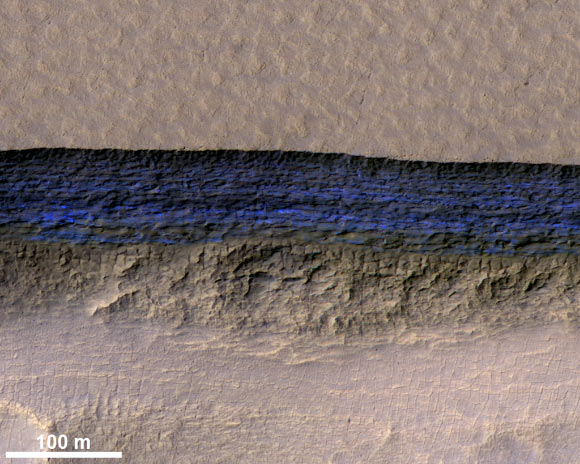 This high-resolution HiRISE image shows a detailed subsection of an icy scarp on Mars in enhanced color. Image credit: NASA / JPL / University of Arizona / USGS.