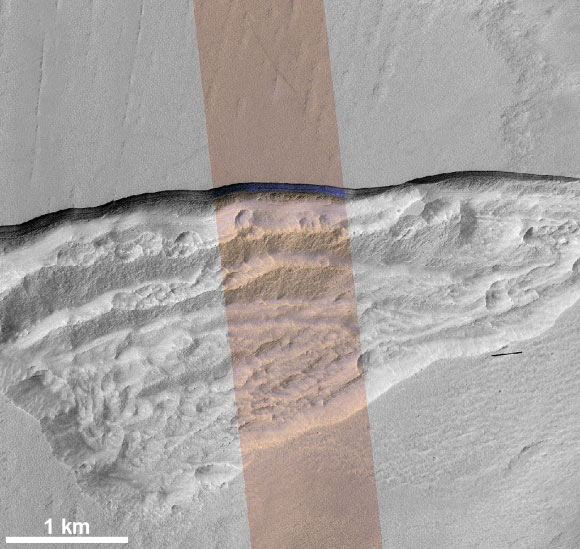 This HiRISE image shows an icy scarp on Mars in the context of a broader area. Image credit: NASA / JPL / University of Arizona / USGS.