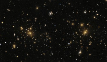 This Hubble image shows A1758N, the northern part of the galaxy cluster Abell 1758. The cluster is approximately 3.2 billion light-years from Earth and is part of a larger structure containing two clusters sitting some 2.4 million light-years apart. But A1758N itself is further split into two sub-sections, known as East (A1758NE) and West (A1758NW). Image credit: NASA / ESA / Hubble.